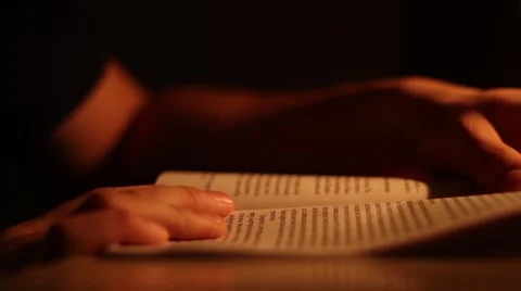 Reading a book in the night Stock Footage 58810129