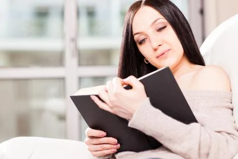 Reading a book Stock Photos