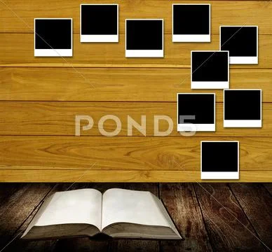 Reading book with photo frames post on wooden wall Stock Illustration