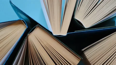 Reading of books.Books  on a blue background. Knowledge and Learning Stock Footage 158194105