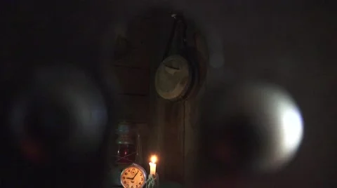 Reading by candlelight, rustic cabin Stock Footage 58968344