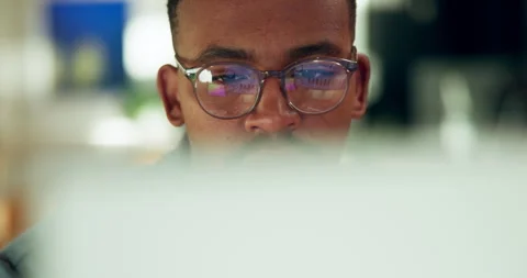 Reading, computer and black man with glasses for online report, seo review and Stock-Footage 337472891