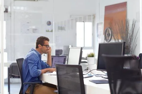 Reading, computer and business man in office for funding, project managemen.. Stock Photos