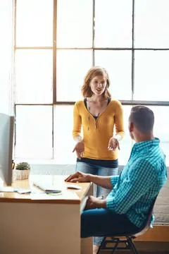 Reading, computer and man with mentor in creative agency, article evaluatio.. Stock Photos