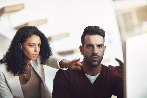 Reading, computer and shock with business people in office for journalist e.. Stock Photos