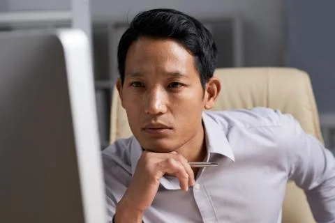 Reading data on computer screen Foto stock