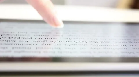 Reading on digital tablet HD Dolly 1080i Stock Footage 34360550