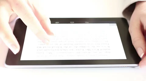 Reading on digital tablet HD Dolly 1080i Stock Footage 34360586