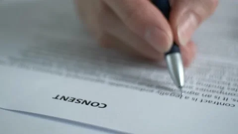 Reading documents on informed consent to the processing of personal data. Stock Footage 157271259