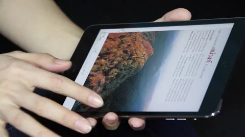 Reading E-book with tablet Stock Footage 56249271