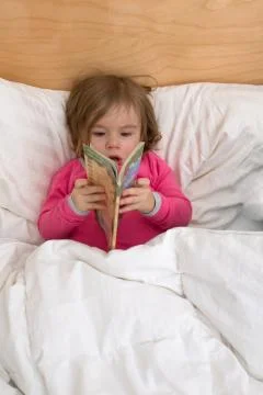 Reading early age Stock Photos