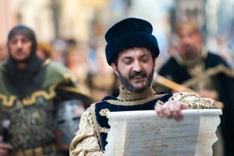 Reading an edict in the middle ages Stock Photos