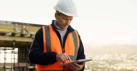 Reading, engineer and man with tablet at construction site, building development Stock Photos