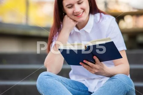Reading favorite book Stock Photos