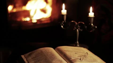 Reading at the fireplace Stock Footage 1058811