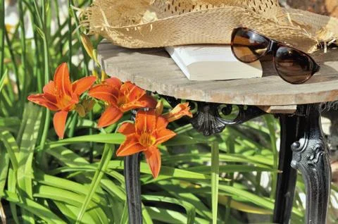 Reading in garden Stock Photos