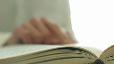 Reading with Glasses Stock Footage 22643415