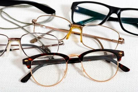 Reading glasses on the white table Foto stock