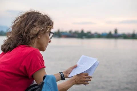 Reading guidebook Stock Photos