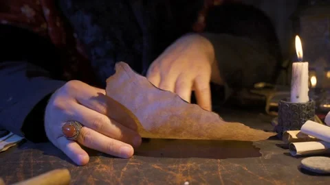 Reading a historical period document.  Stock Footage 199309783