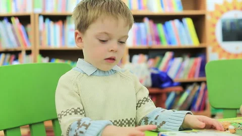 Reading from infancy Stock Footage 213931763