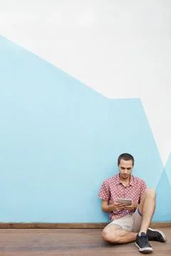 Reading up on interesting facts Stock Photos