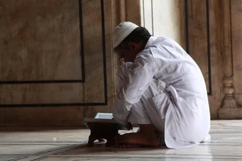 Reading The Koran In Mosque Stock Photos