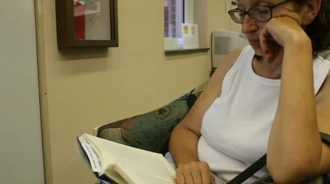 Reading in the library Video stock 765689