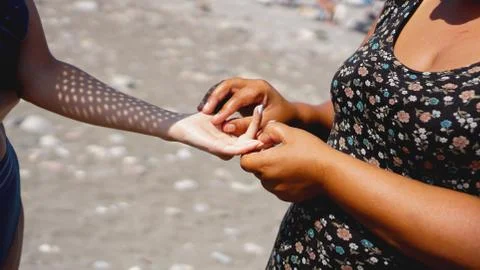 Reading the lines hand in a womans hands Stock Photos