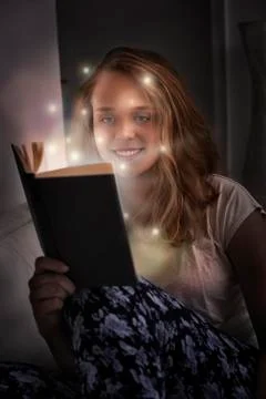 Reading magical book Stock Photos