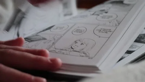 Reading manga Stock Footage 148054007