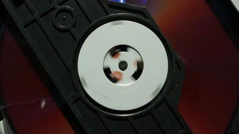 Reading optical disk in the player 4K slow motion footage Stock Footage 143505205