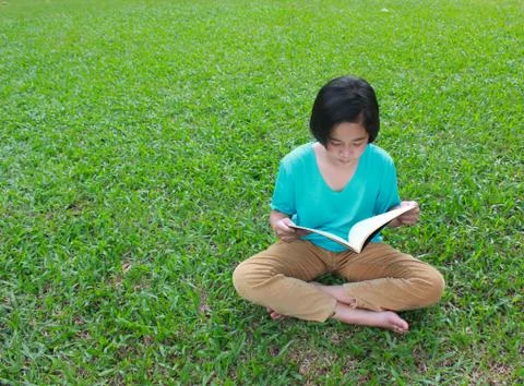 Reading in the park Stock Photos