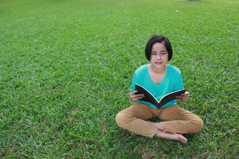 Reading in the park Stock Photos