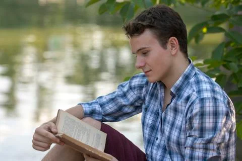 Reading in the park Stock Photos