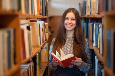 Reading for pleasure, getting knowledge and enjoying education Stock Photos