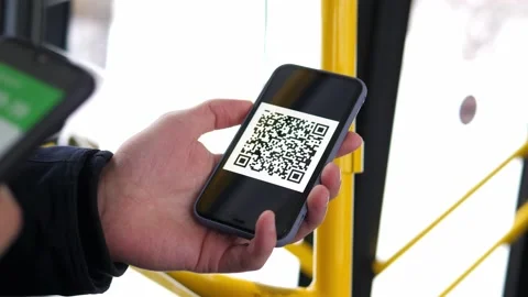 Reading a QR code using a smartphone. Using QR code to check COVID-19 Stock Footage 165537388