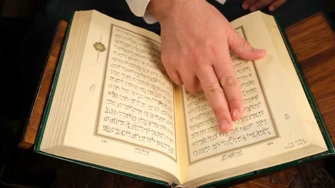 Reading quran close up Stock Footage 172455010