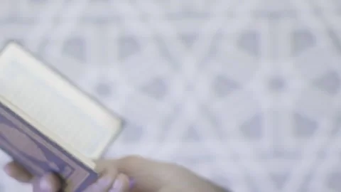 Reading the Quran Stock Footage 212004375