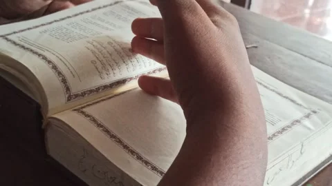 Reading the Quran with Translation Stock Footage 255085680