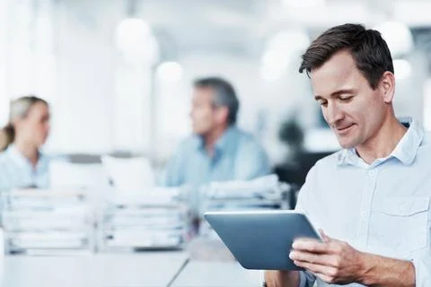 Reading, scroll and tablet with business man in office for online bookkeepi.. Stock-Fotos