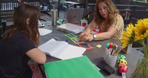Reading specialist gives one on one, Multi-Sensory tutoring session. Outdoors Stock Footage 155660997