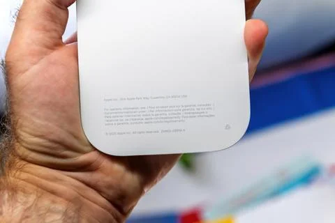 Reading Specifications on iPhone Air Bumper Packaging Stock Photos