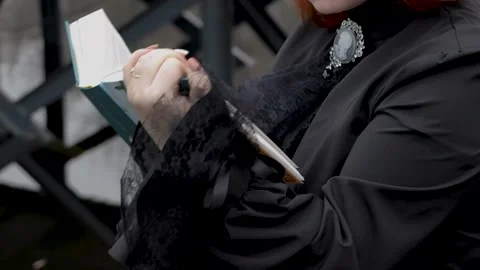 Reading on the street Stock Footage 164898050