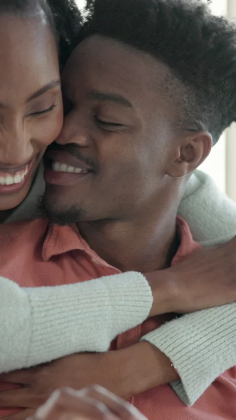 Reading, tablet and couple with hug in home, browsing internet and support for Stock Footage 336731341