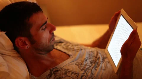 Reading on tablet Stock Footage 29158520