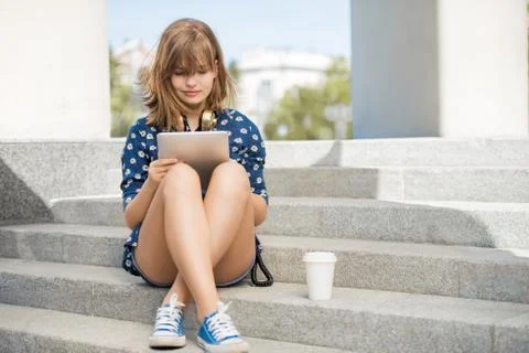 Reading on tablet. Stock Photos