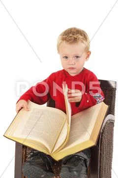 Reading a thick book Stock Photos