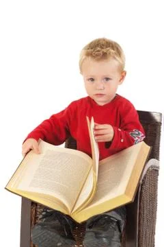 Reading a thick book Foto stock