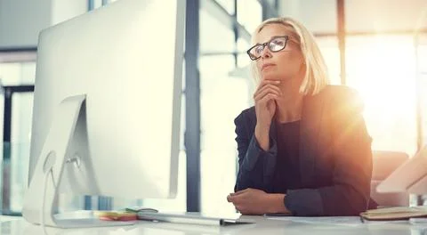 Reading, thinking and computer with business woman in office for idea, credit Stock Photos